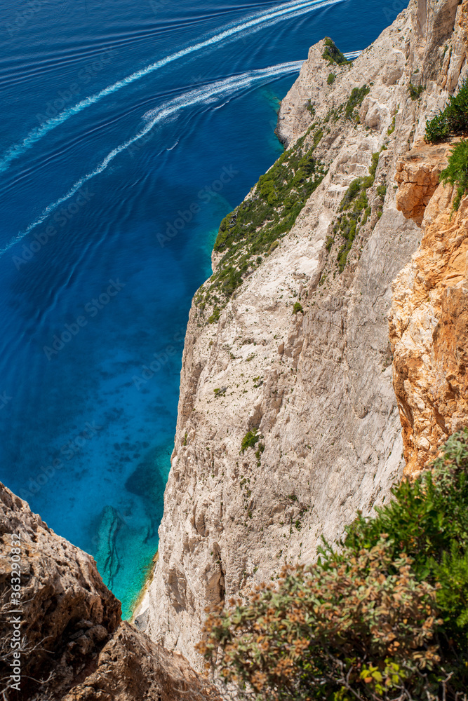 View down the steep cliff to the blue Mediterranean Sea, Zakynthos, Greece