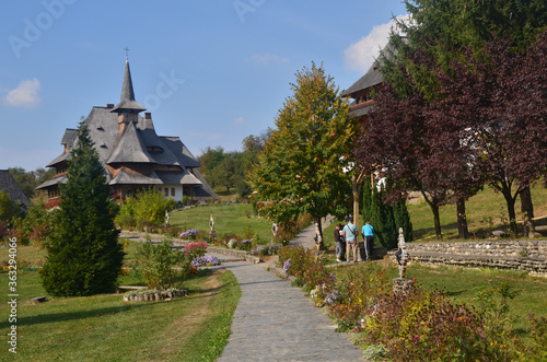 Traditional Maramures wooden architecture of Barsana monastery, Romania photo