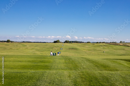 Golf course view on a sunny day blue sky golf concept © PhotoHunter