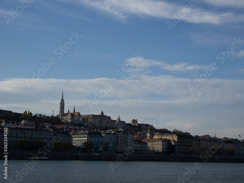 Budapest Royal Castle and Szechenyi Chain Bridge at day time from Danube river, Hungary.   © monthss