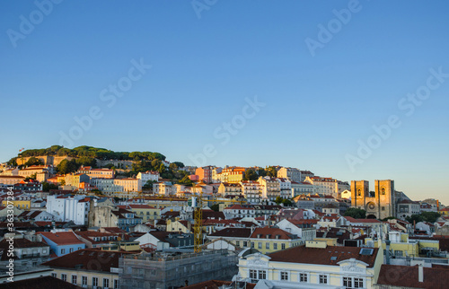 Fototapeta Naklejka Na Ścianę i Meble -  Lisbon rooftops with Se Cathedral (Santa Maria Maior de Lisboa), in Portugal, Europe