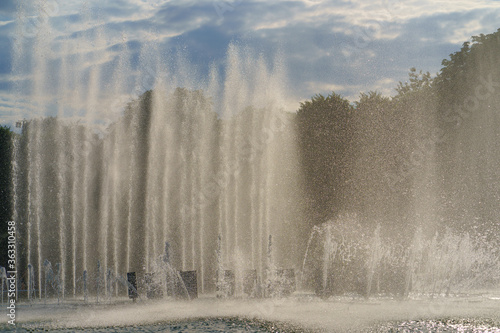 Photography of fountains and blue sky. Hot summer day in the Moscow public park.