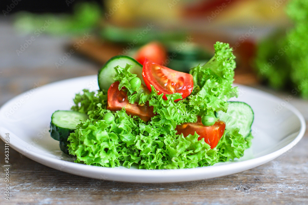 Healthy salad vegetables leaves mix micro greens, juicy snack, tomato. food background copy space for text organic healthy eating keto or paleo diet Healthy salad vegetables leaves mix micro greens, juicy snack, tomato. food background copy space for text organic healthy eating keto or paleo diet