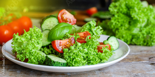 Healthy salad vegetables leaves mix micro greens, juicy snack, tomato. food background copy space for text organic healthy eating keto or paleo diet