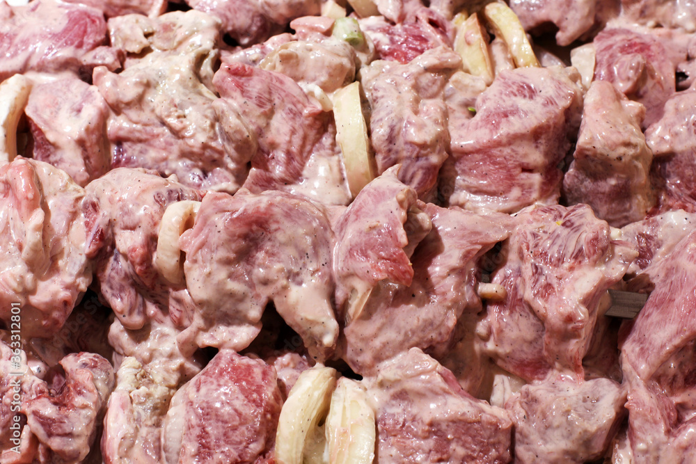 Pickled kebab. Fresh meat with onions. Food background Pickled kebab. Fresh meat with onions. Food background