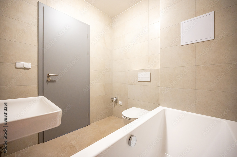 Bathroom and toilet in an apartment for rent. Real estate photo. Bathroom and toilet in an apartment for rent. Real estate photo.