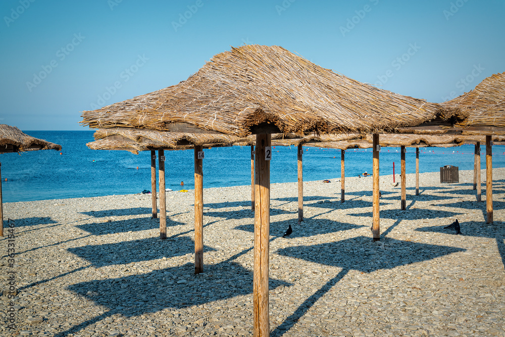 Umbrellas on the beach in Nebug, Russia Umbrellas on the beach in Nebug, Russia