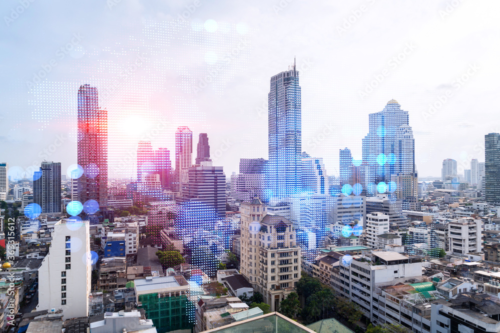 Fototapeta premium World planet Earth map hologram over panorama city view of Bangkok, Asia. The concept of international connections and business. Multi Exposure.