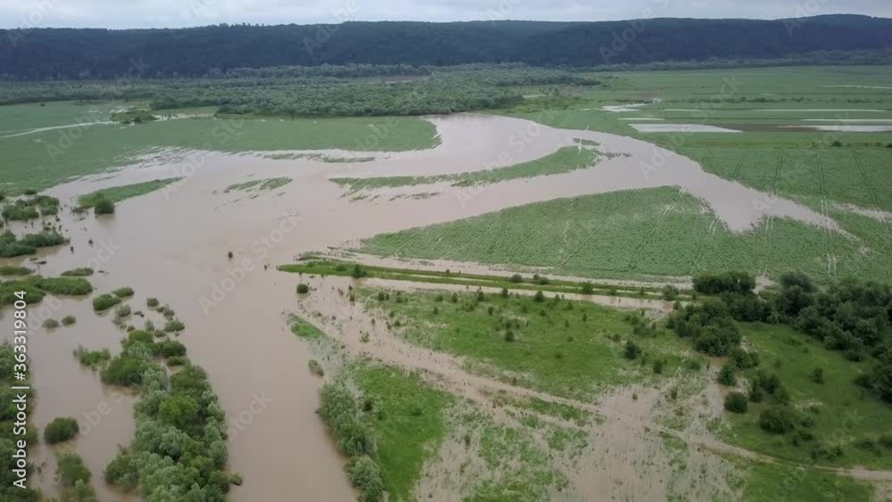 Aerial view flooded road heavy rain flooding taken during drone flight overflowing river storm water, danger wet disaster damage grass, climate lake high stream season environmental ecology rural Aerial view flooded road heavy rain flooding taken during drone flight overflowing river storm water, danger wet disaster damage grass, climate lake high stream season environmental ecology rural