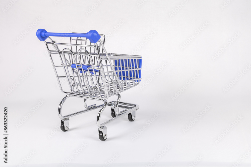 Shopping cart with blue elements on a white background. Shopping cart with blue elements on a white background.