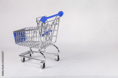 Shopping cart with blue elements on a white background.
