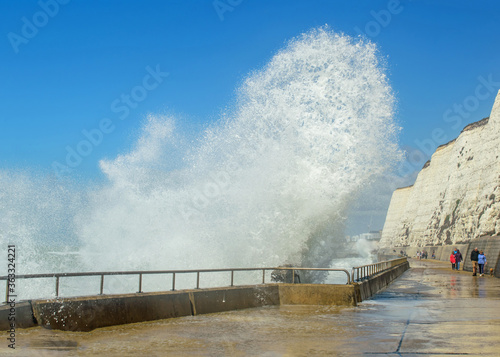 High stormy waves at the seafront photo