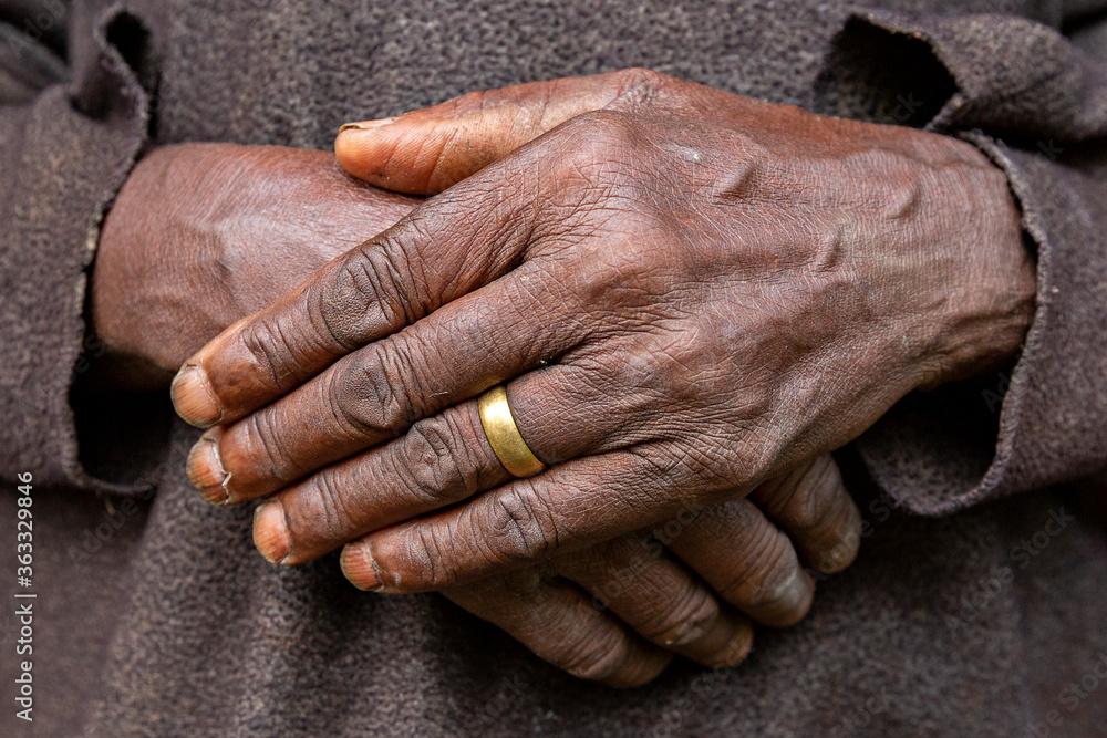 Fototapeta premium Hands of elderly woman in Uganda, Africa