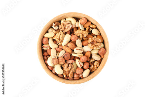 Bowl with different nuts isolated on white background. Vitamin food
