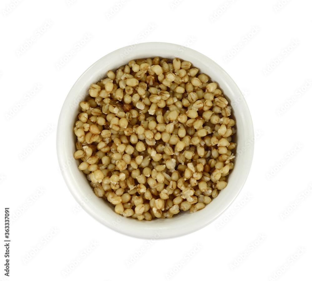 Cooked bulgur wheat isolated on white.