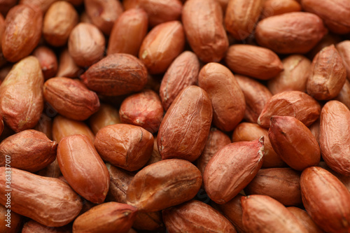 Tasty peanut on whole background, close up. Vitamin food