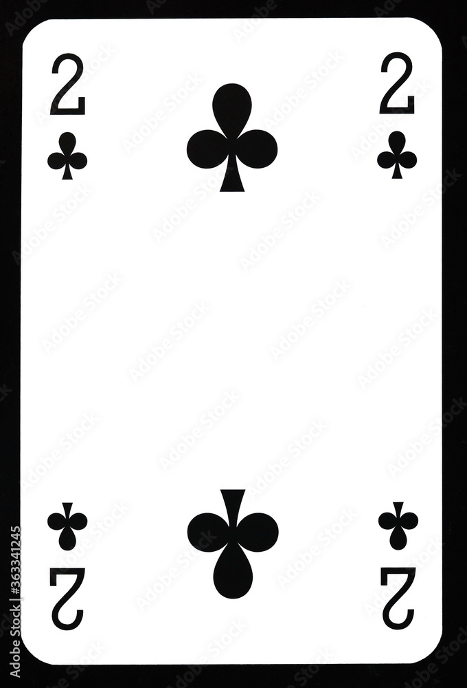 Two of clubs playing card isolated on black. Two of clubs playing card isolated on black.