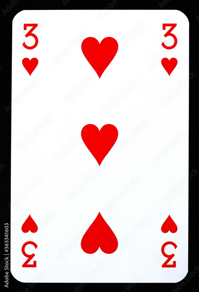 Three of hearts playing card isolated on black. Three of hearts playing card isolated on black.