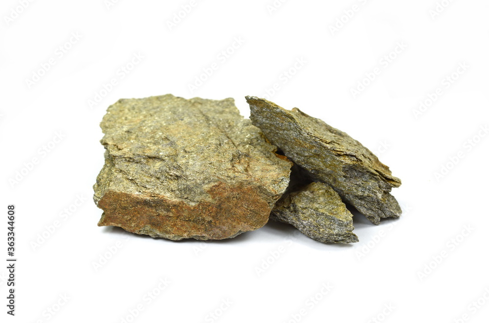 Flat stone isolated on white. Layered stone of beautiful natural color. Flat stone isolated on white. Layered stone of beautiful natural color.