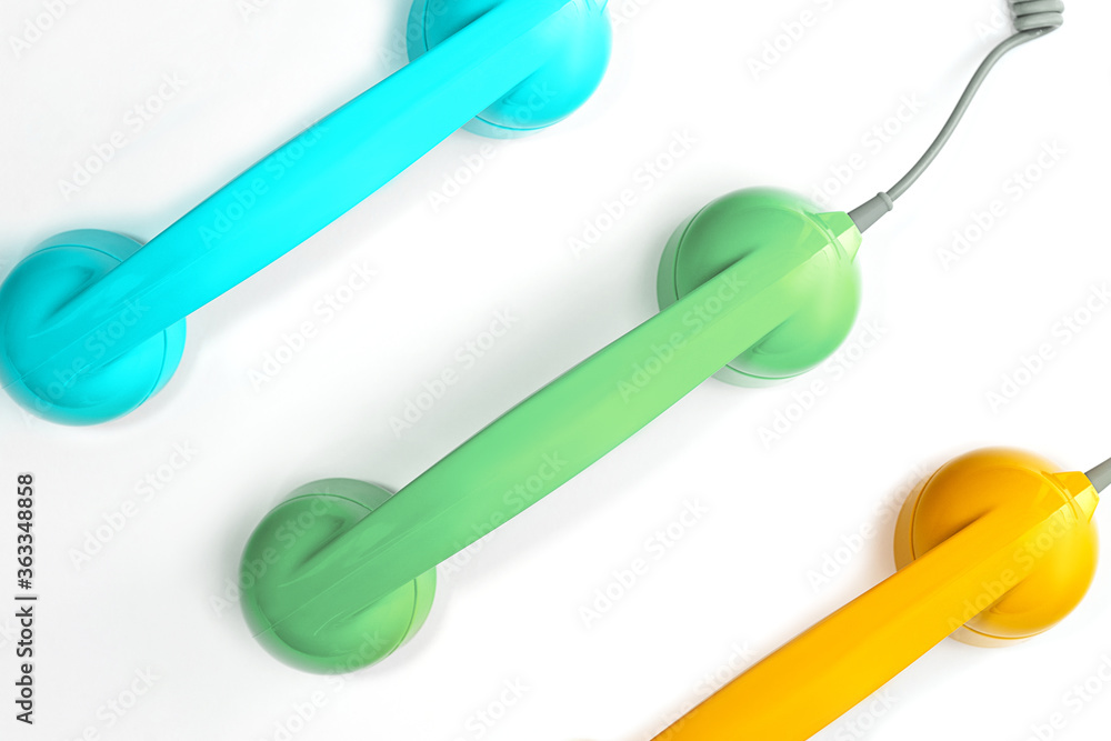 Pattern made from neo green mint, yellow and blue color handset of a telephone. Pattern made from neo green mint, yellow and blue color handset of a telephone.