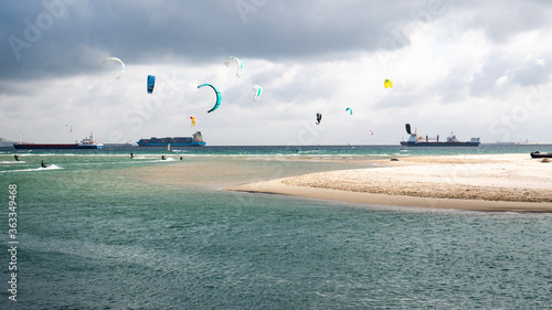 Skysurfing in the Gibraltar bay/Algeciras on the beach and many cargo ships on back ground