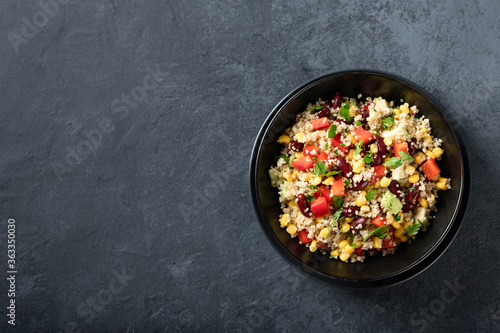 quinoa, corn, bean and avocado salad. Healthy food concept, top view
