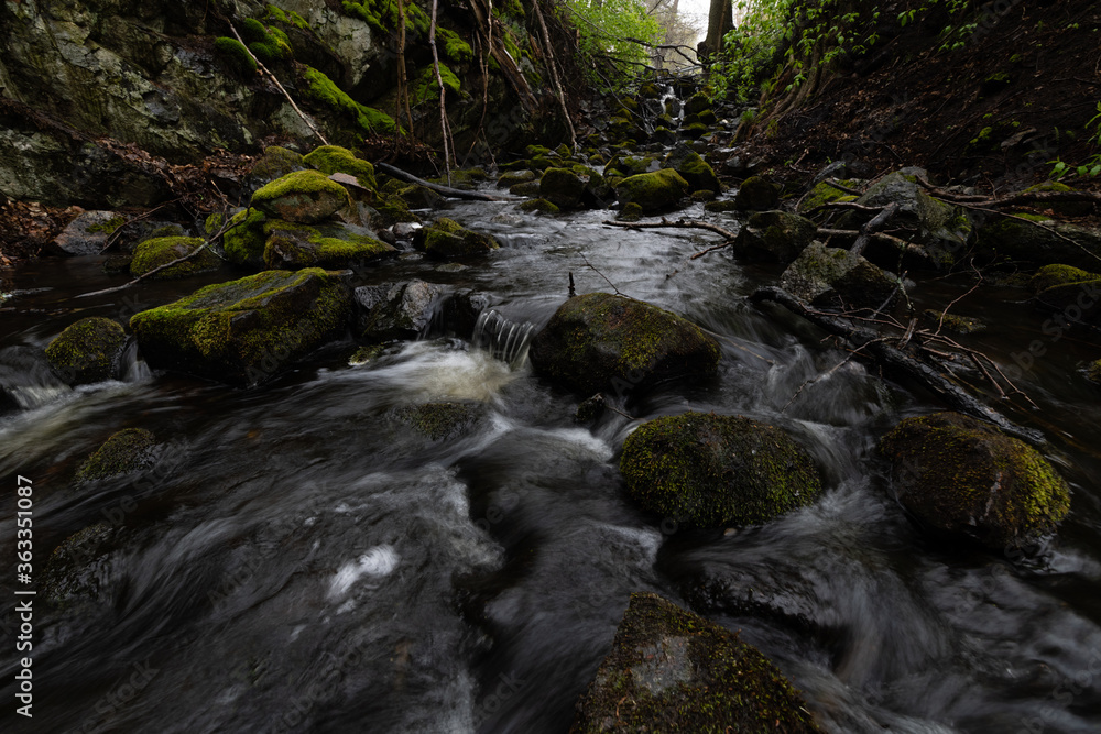 Obraz premium small waterfall in the forest outside stockholm