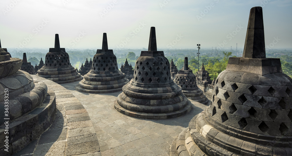 (Selective focus) Stunning view of the Borobudur bell shaped stupas ...