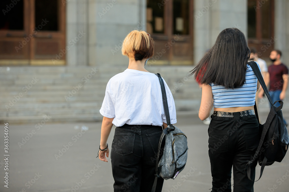 two woman in street
