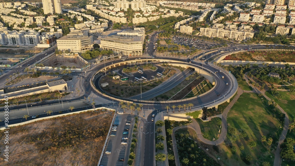 Modiin City Traffic Roundabout And Buildings, 
Sunset July, 2020, Israel