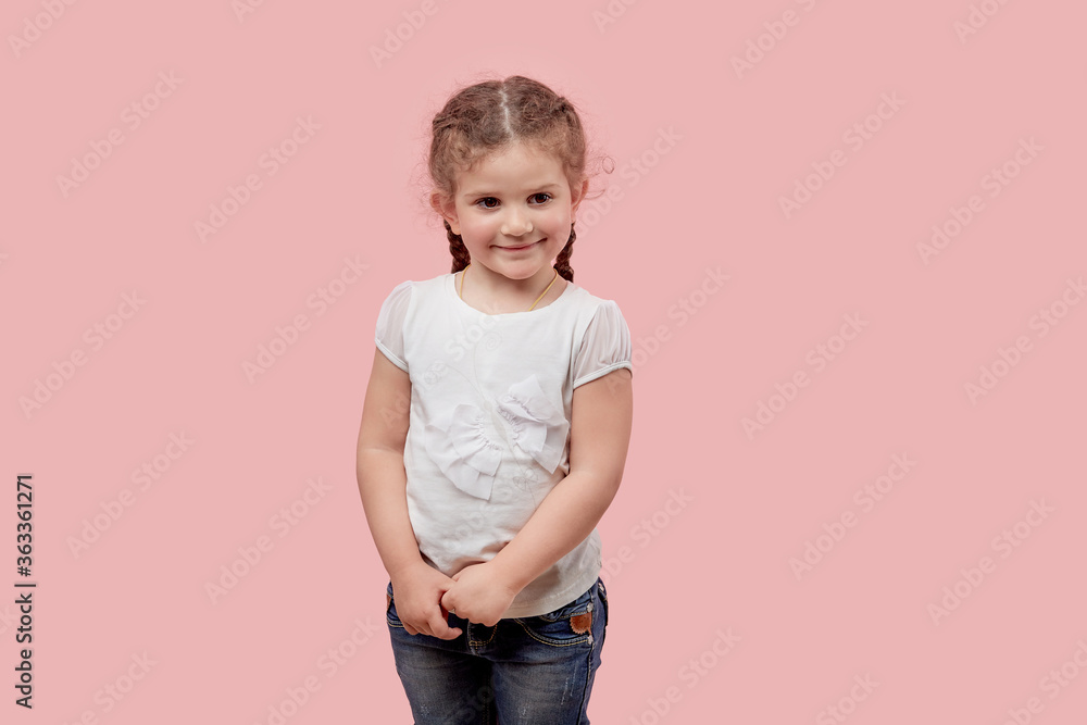 Little cute beautiful blonde girl looks in the frame. Little cute beautiful blonde girl looks in the frame.