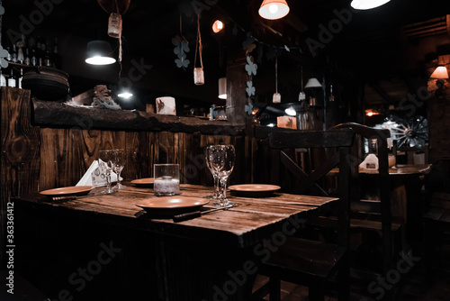 Interior of a beautiful and cozy irish pub, full of drinks, beers and food to spend a good time
