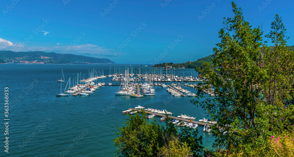 A view over the marina of  Fezzano from the road to Porto Venere, Italy in the summertime