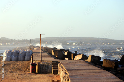 Breakwater on the Emerald Coast, La Balconada beach, La Paloma Municipality, Rocha Department, Uruguay photo