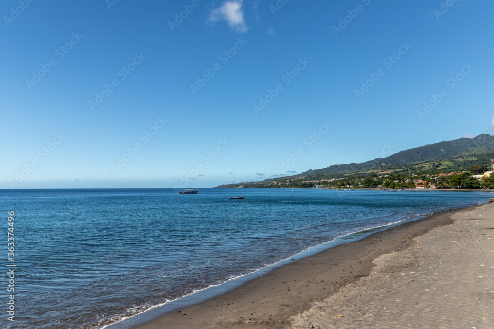 Black sand beach in Saint-Pierre, Martinique, France
