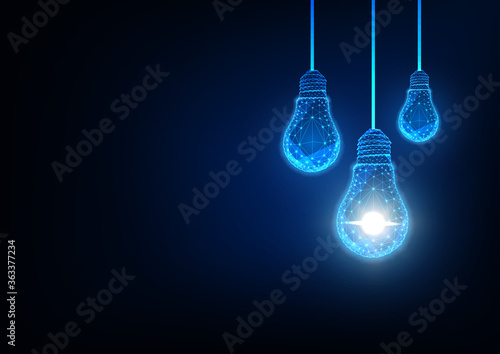 Futuristic idea, innovation, creative solution concept with glowing low polygonal light bulbs