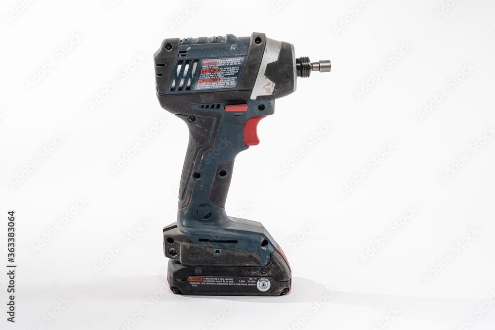 Impact Driver drill isolated on a white background
