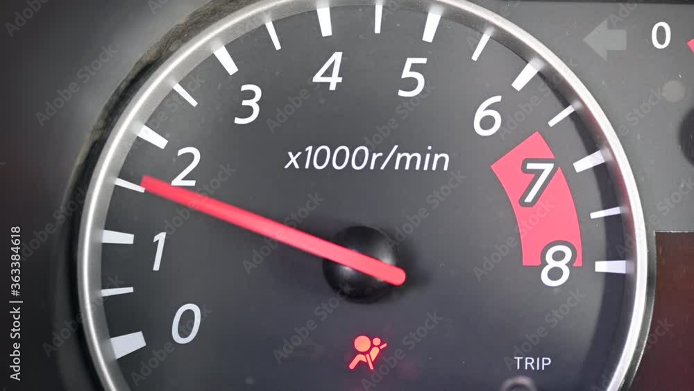 Red arrow on the tachometer moves and shows engine speed. The vehicle dashboard Red arrow on the tachometer moves and shows engine speed. The vehicle dashboard