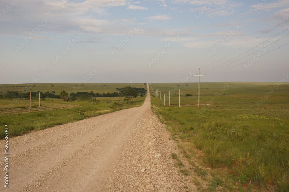A country road in the wide open Kansas prairie.