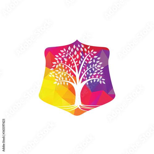 Tree Roots shield vector logo design. shield Vector tree with roots logo element.