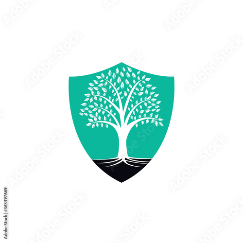 Tree Roots shield vector logo design. shield Vector tree with roots logo element.