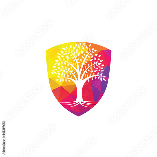Tree Roots shield vector logo design. shield Vector tree with roots logo element.