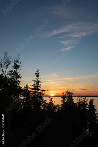 Sunset Peeking Over the Treeline