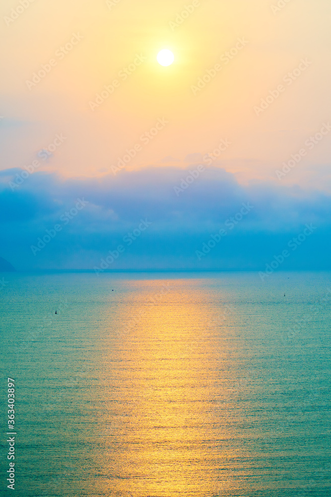 Sun over the ocean. Beautiful tropical background.