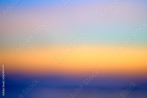 Out of focus abstract background of beautiful sunset on Bali. © Ruslan Kokarev