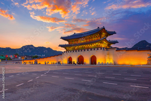 Sunset over Gwanghwamun gate, Seoul, South Korea. ( Sign board text is 