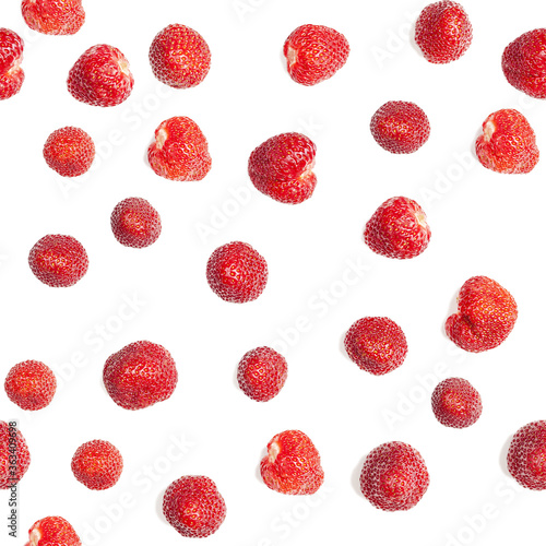 lots of strawberries on a white background, use as a seamless texture or background