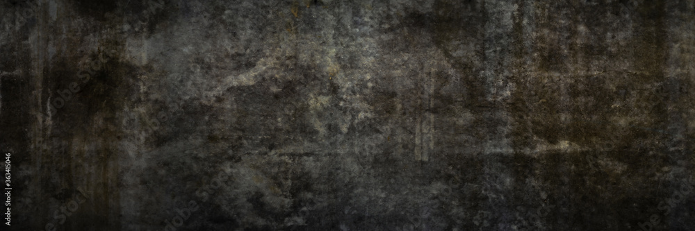 Texture of a grungy black concrete wall as background