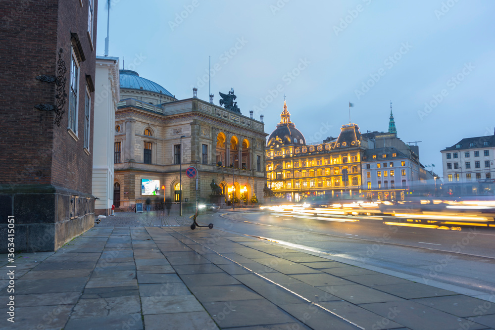 View of King's New Square at dusk with trail of car light in Copenhagen, Denmark