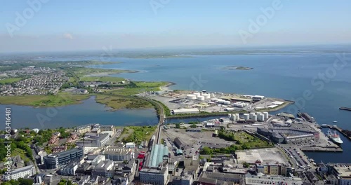 Flying over train track in Galway City 4K photo